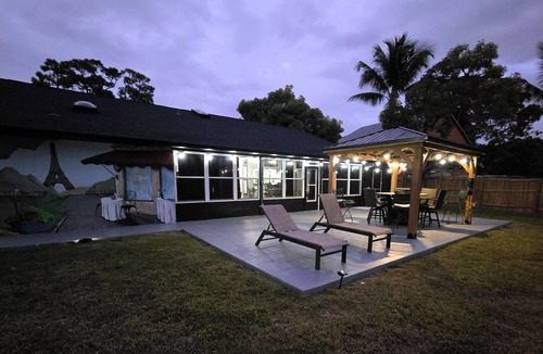 Port Saint Lucie House | Parisian Escape in Port St. Lucie! Complete with Spacious Arcade! Bienvenue!