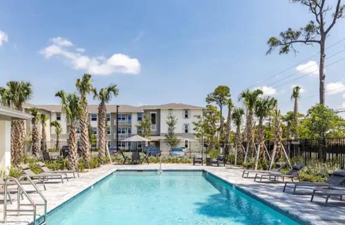 Greenacres Apartment | 'penta' at Aviara Green - Modern Apartment & Pool