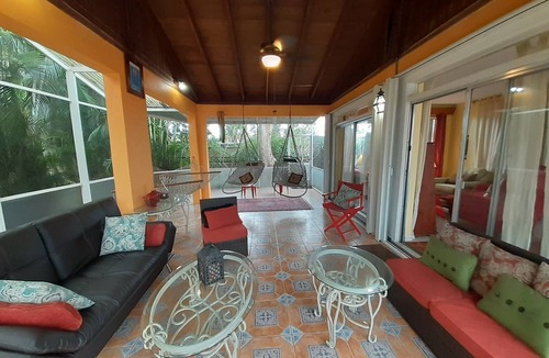 Lake Worth Corridor House | Plumaria Room with private bathroom on shared lakeview House