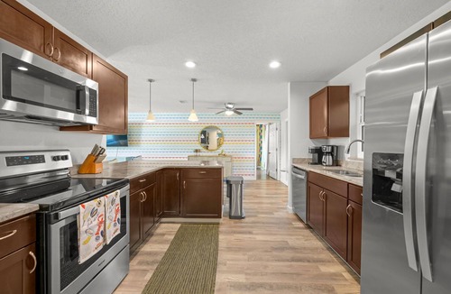 Palm Harbor House | Pool, Games & More—Fun for Everyone!