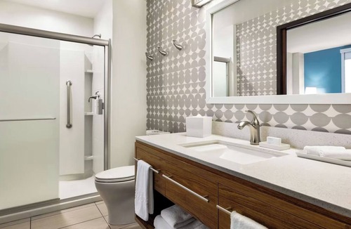 Queens Hotel | Refreshingly Stylish King Suite w/Expanded Bedroom Comfort & a Welcoming Lounge