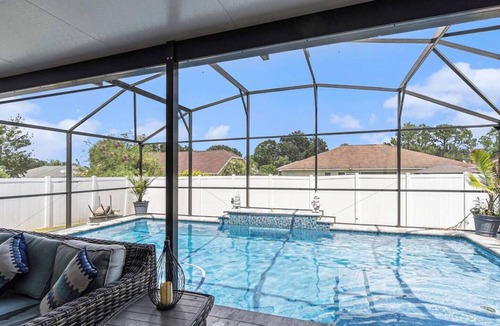 Lakeland House | Relax in Heated Saltwater Pool w/Screened Lanai