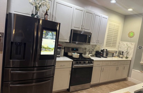 Riverview House | Relax in my calm and stylish space. Enjoy the relaxing lakeview and heated pool.
