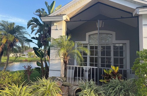 Riverview House | Relax in my calm and stylish space. Enjoy the relaxing lakeview and heated pool.