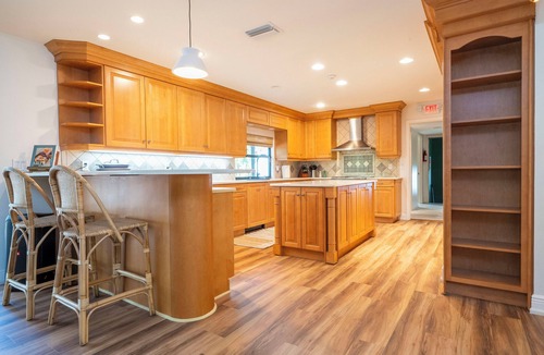 Trailer Estates House | Relaxing 4BR/3BA home near IMG & beaches – with game room & yoga space