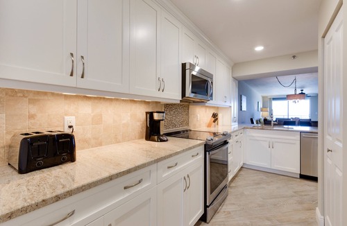 Marco Island Condo | Remodeled Luxurious Direct Beachfront Somerset Condo-with Den sleeping area