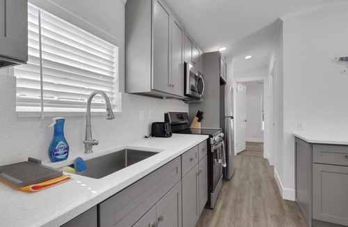 Naples Cottage | Renovated Naples Retreat- Resort Pool & Game Room