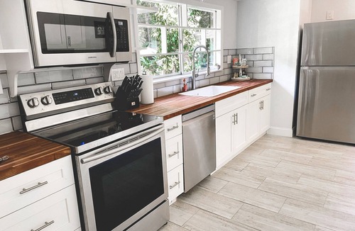 Melbourne House | Renovated Saltwater Pool Home w/King bed Sleeps 8