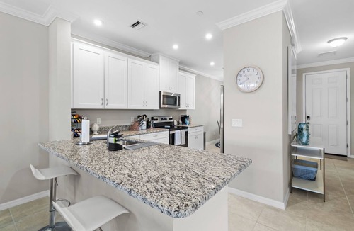 Naples Condo | Resort Living, Professionally Decorated, END Unit,1st Floor, Stunning Water View
