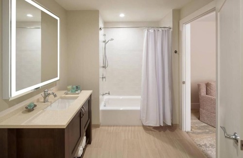 Holmes Beach Hotel | Resort-Style Villa with Kitchen, Balcony and Pool Near AMI Gulf Waters & Trails