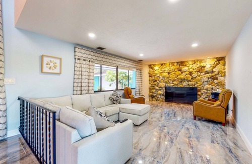 Fort Myers Shores House | Riverfront home - pool, pool spa, dock, & bikes