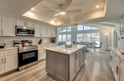 Yacht Club Villa | Riverview at Dolphin Drive - A gem in the Yacht Club area with stunning sunsets.