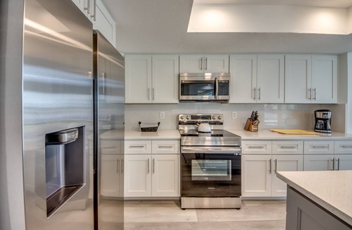 Yacht Club Villa | Riverview at Dolphin Drive - A gem in the Yacht Club area with stunning sunsets.