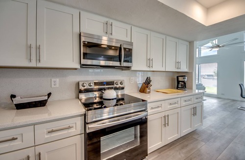 Yacht Club Villa | Riverview at Dolphin Drive - A gem in the Yacht Club area with stunning sunsets.