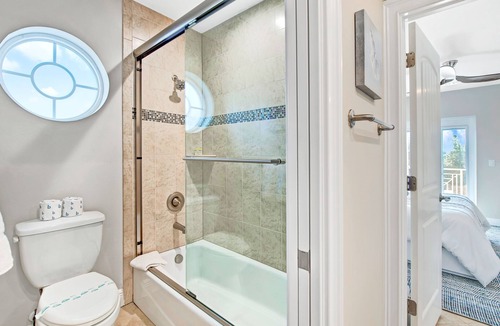 Holmes Beach House | Roof top deck and Private pool with waterfall. 1 minute walk to the beach!