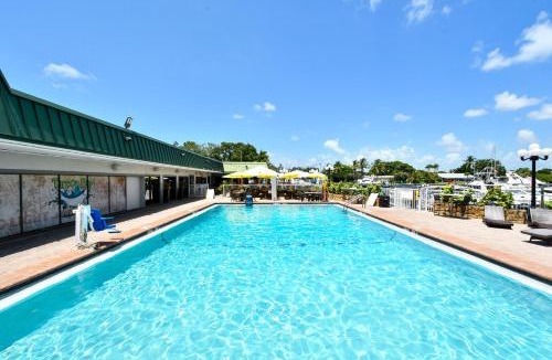 Trailer Estates Apartment | Room 127 - Waterfront, Heated Pool, Huge TV, Tiki Bar & Grill