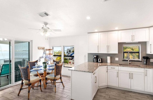 Cudjoe Key House | Salty Breeze #161 Canal-Front Retreat with Dock, Pool & Ocean Views