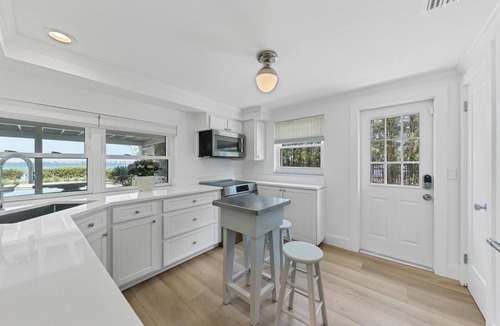 Sarasota House | Sarasota Renovated Waterfront Home with Dock Wide Open Bay Views Heated Pool