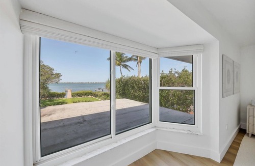 Sarasota House | Sarasota Renovated Waterfront Home with Dock Wide Open Bay Views Heated Pool