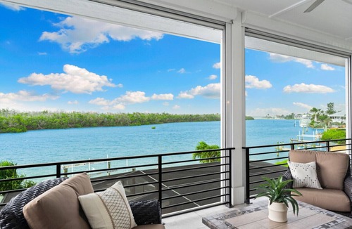 Bonita Springs House | Seafoam Serenity - Bayfront Retreat w/Dock, Pool + 1 Min Walk to Bonita Beach