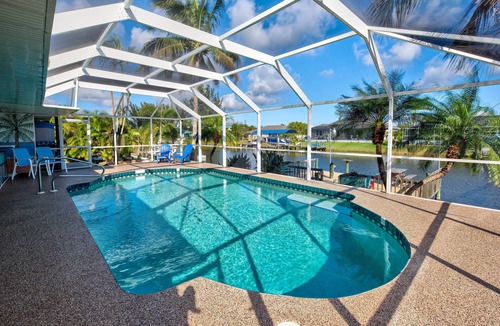 South Gulf Cove House | Seas the Day- Waterfront Pool Home, Private Dock, Gulf Access in Port Charlotte
