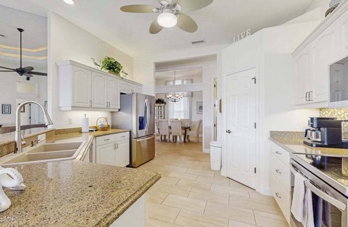 South Gulf Cove House | Serene and elegant with heated pool, water views, family and dog friendly, W/D