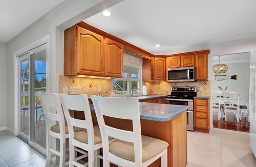 Jensen Beach House | Serene LAKE House 3br Heated POOL Home - near the beach and quiet!