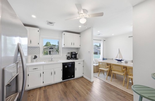 Town Bank House | Shore Retreat: 5 Bd home with alfresco living, hot tub, firepit, BBQ and games