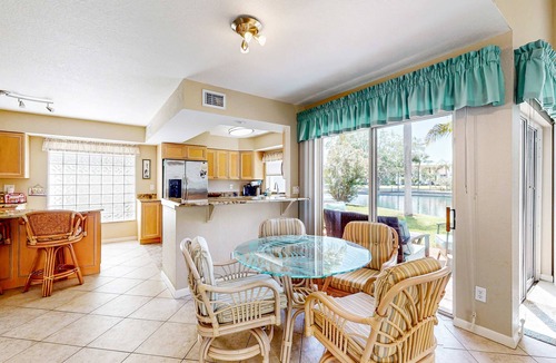 Isla del Sol House | Snowbird friendly townhouse near downtown with heated pool hot tub grill golf