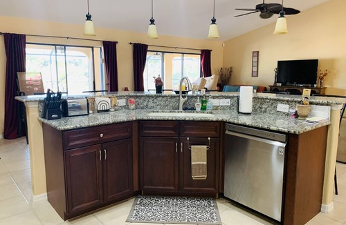 South Gulf Cove House | SO. GULF COVE - WATERFRONT HOME ON CANAL-SALT WATER POOL & SPA-NEAR GULF BEACHES