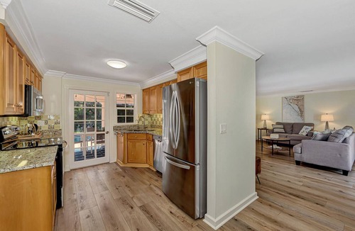 Bay Isle House | Soak in the Siesta Sunshine! Rest and relax in your pool and spa!