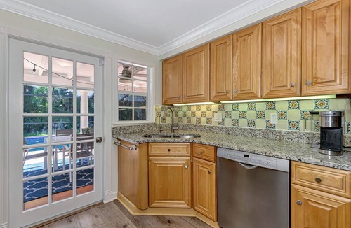 Bay Isle House | Soak in the Siesta Sunshine! Rest and relax in your pool and spa!