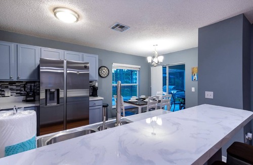 Haines City House | Southern Dunes Pool Home w Golf Cart Available