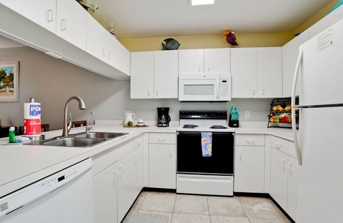 Holmes Beach House | Spacious 3 bedroom town home on Anna Maria Island, community pool.