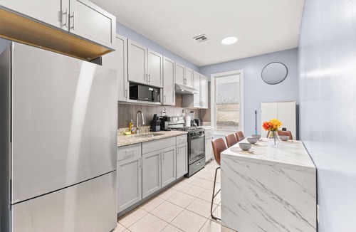 McGinley Square House | Spacious 3-bedroom home - FREE Parking, Pool Table, Ping Pong near NYC!