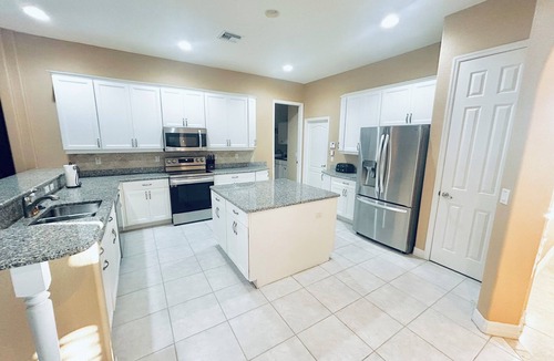 Yacht Club House | Spacious 4 bed 3 bath heated pool home with hot tub in prime Cape Coral location