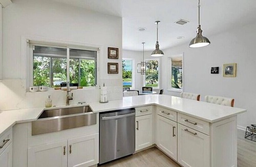 Palm City House | Spacious 4-bedroom house with AC, WiFi in charming Palm City