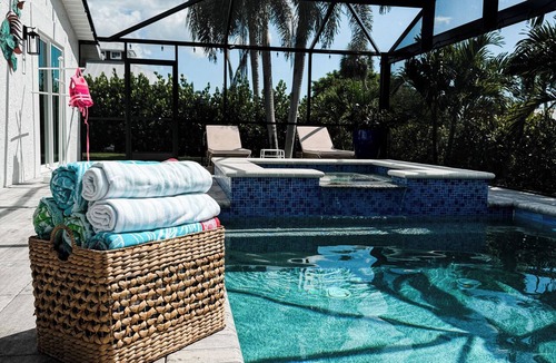 Bonita Springs House | Spacious 4BR/3BA retreat. Heated Pool + Hot Tub, just 5 Miles to Bonita Beach