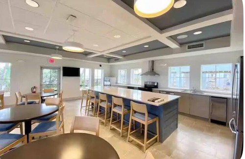 Jensen Beach House | Spacious~Dog Friendly~Partial River View~Heated Pool~BBQ Grill~Gym~Laundry too!