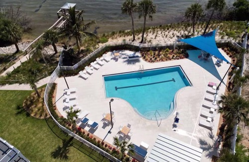 Jensen Beach House | Spacious~Dog Friendly~Partial River View~Heated Pool~BBQ Grill~Gym~Laundry too!
