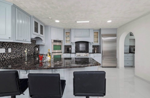 Clair-Mel City House | Spacious villa w/heated pool & game room