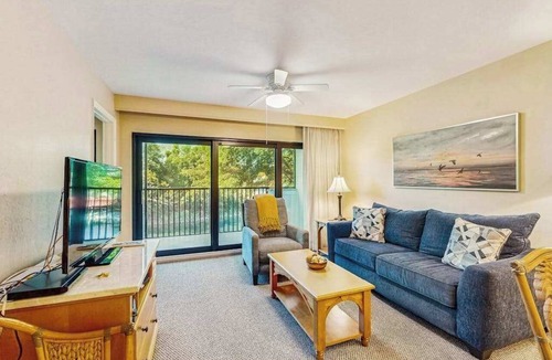 Park Shore Condo | Spacious, waterfront condo with outdoor pool, tennis, & volleyball