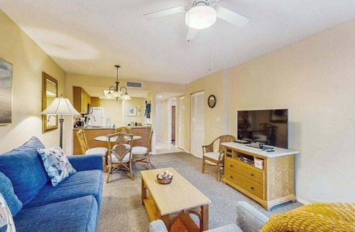 Park Shore Condo | Spacious, waterfront condo with outdoor pool, tennis, & volleyball