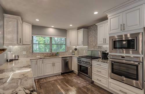 Melbourne House | Sprawling 5bd/3ba Pool Spa Chef Kitchen Dntn Melb USSSA