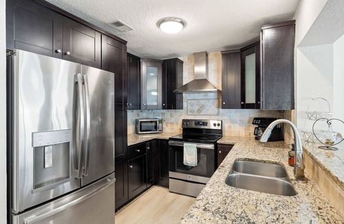 Pinellas Park House | St. Pete Pool Oasis - Steps to the Beach!