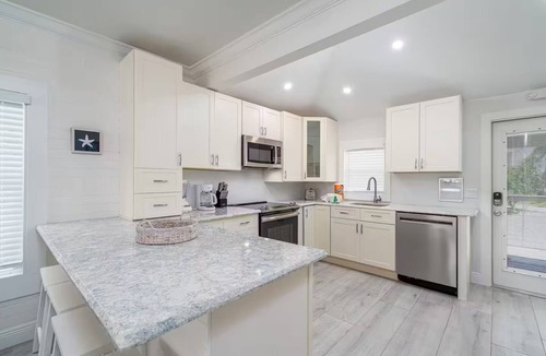Fort Myers Beach House | Stay and Play by the Bay Boaters Delight. Waterfront ,Dockage and Heated Pool