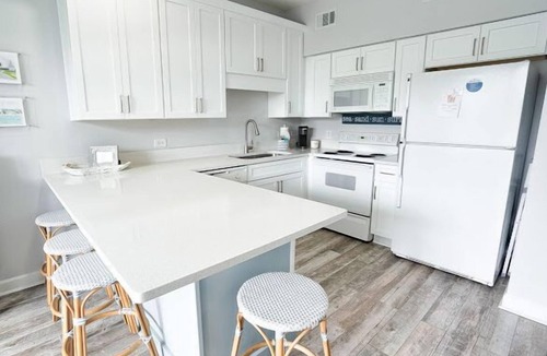Gulf Place Condo | Steps to the beach!