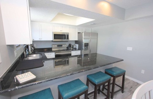 Indian Shores Condo | Steps to the Sand! Updated Beachfront with Balcony, FREE Parking & FREE Activities ~ 5 Pipers Nest