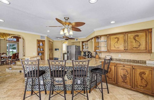 Pelican House | Striking European-style home w/private pool, hot tub & river access via dock