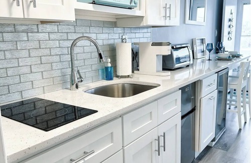Brigantine Condo | Stylish condo steps from the beach! Elegant blend of comfort and convenience.